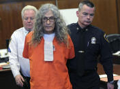 FILE - In this Jan. 7, 2013, file photo, convicted serial killer Rodney James Alcala appears in court in New York. Alcala was sentenced to an additional 25 years to life in prison after pleading guilty to murdering two young women here in the 1970s. Alcala, a prolific serial torture-slayer dubbed "The Dating Game Killer" has died while awaiting execution in California. Rodney James Alcala was 77. He died of natural causes at a hospital in San Joaquin Valley, Calif., prison officials said in a statement. Alcala was sentenced to death in 2010 for five slayings in California between 1977 and 1979, including that of a 12-year-old girl, though authorities estimate he may have killed up to 130 people across the country. (AP Photo/David Handschuh, Pool, File)