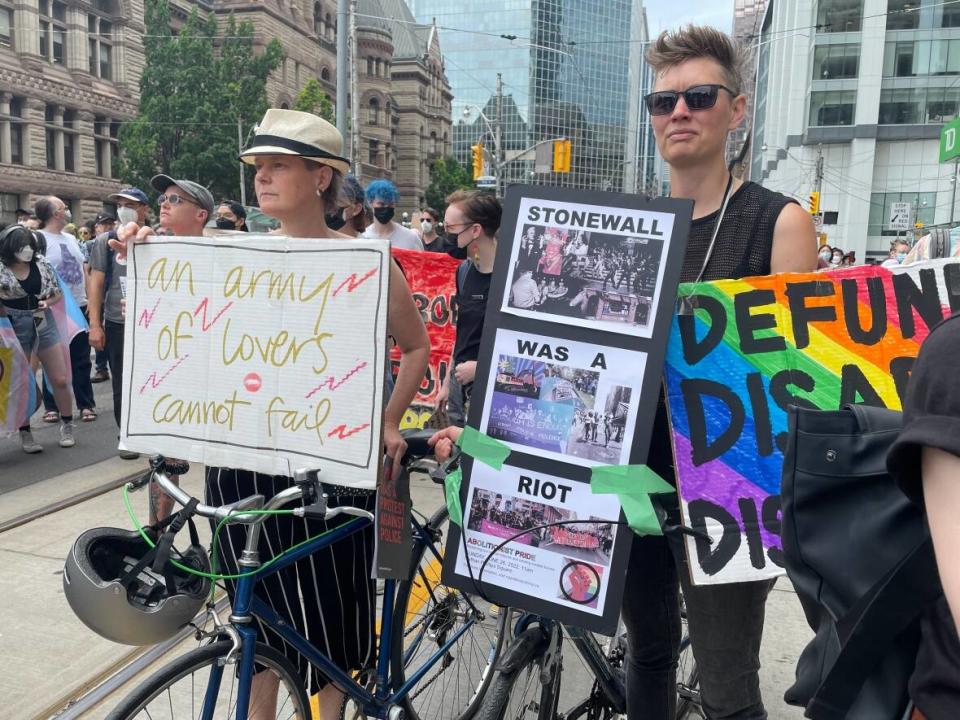 The No Pride in Policing Coalition gathered at Nathan Phillips Square at 11 a.m. for an event it called 'Abolitionist Pride,' then marched to various sites that the coalition says represent queer and trans oppression. (Mehrdad Nazarahari/CBC - image credit)