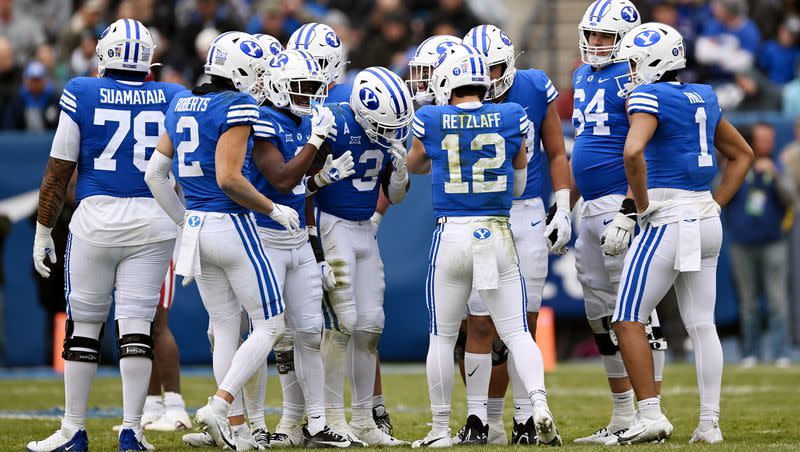 BYU quarterback Jake Retzlaff (12) calls the play in the huddle during game against Oklahoma play at LaVell Edwards Stadium in Provo on Saturday, Nov. 18, 2023. Retzlaff will find himself in a heated battle for QB1 duties when spring camp opens later this month in Provo.