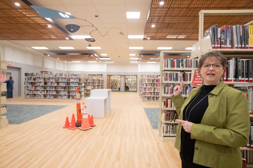 Library CEO Marie Pyko says no books will be removed from the stacks, but changes are happening. More space between the fiction and nonfiction stacks, new hardwood flooring and such other aspects as art installations and TVs are included.