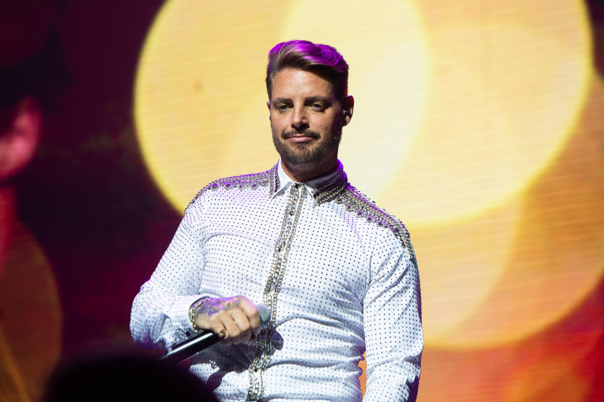 LONDON, ENGLAND - OCTOBER 21:  (EDITORIAL USE ONLY) Keith Duffy of Boyzone performs on stage at the London Palladium during 