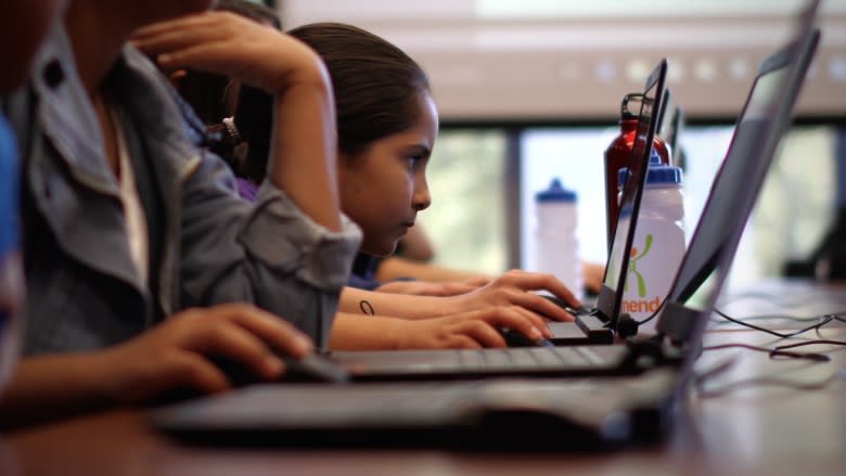 Girls attend a computer coding workshop hosted by Ladies Learning Code. (CBC)