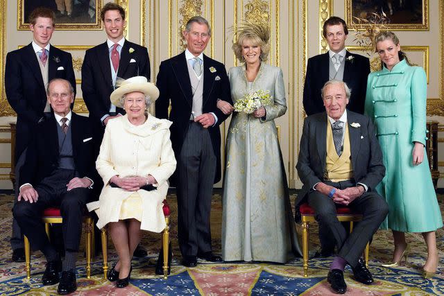 <p>Pool Photograph/Corbis/Corbis/Getty</p> Prince Charles and his new bride Camilla with their families, in the White Drawing Room at Windsor Castle on April 9, 2005.