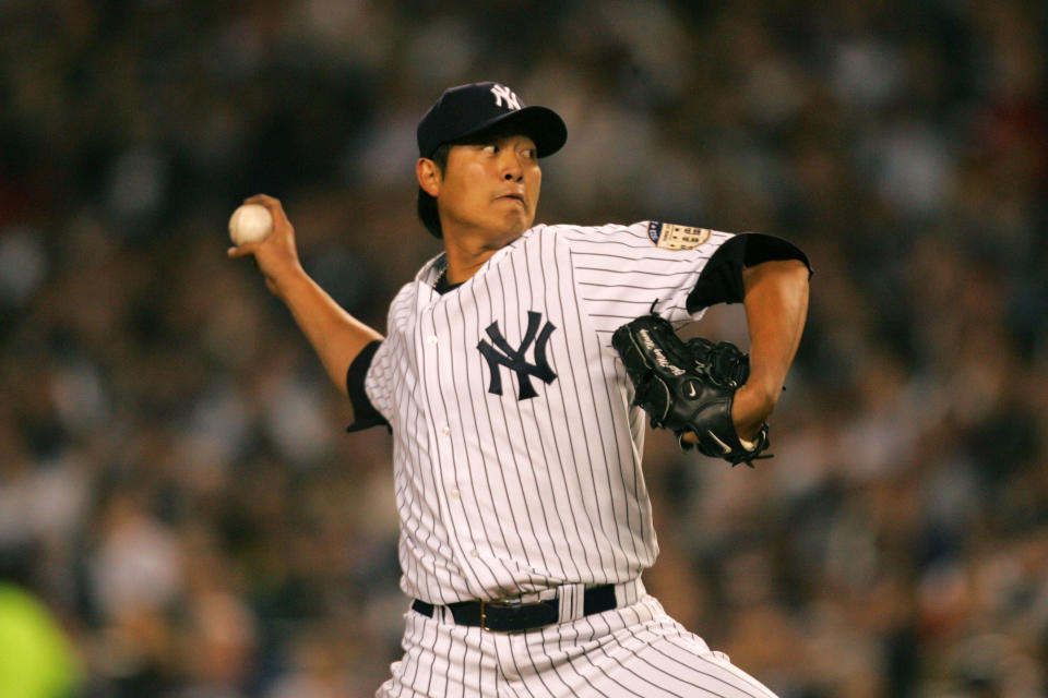 NEW YORK - APRIL 01: Starting pitcher Chien-Ming Wang #40 of the New York Yankees pitches against the Toronto Blue Jays during Opening Day at Yankee Stadium April 1, 2008 in the Bronx borough of New York City.    (Photo by Chris Trotman/Getty Images)