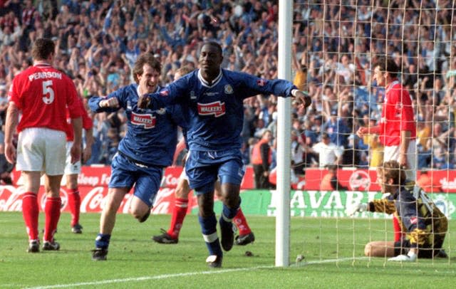 Emile Heskey has revealed he was chased down the street by a Leicester fan before he made his debut 