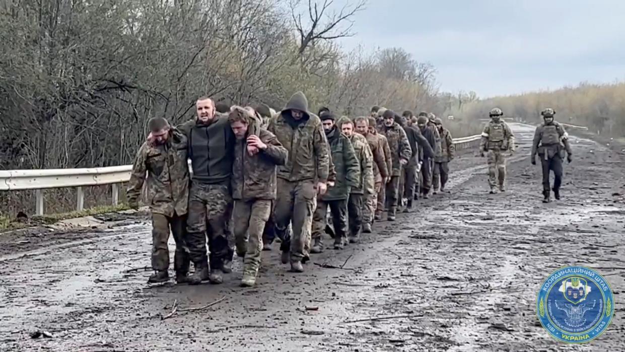 Ukrainian prisoners of war (POWs) are seen during a swap, amid Russia's attack on Ukraine, at an unknown location, Ukraine (via REUTERS)