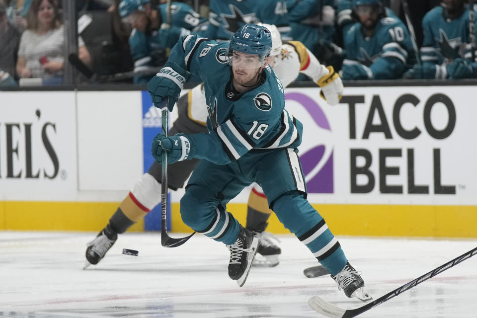 San Jose Sharks right wing Filip Zadina (18) passes the puck during the first period of the team's NHL hockey game against the Vegas Golden Knights in San Jose, Calif., Thursday, Oct. 12, 2023. (AP Photo/Jeff Chiu)