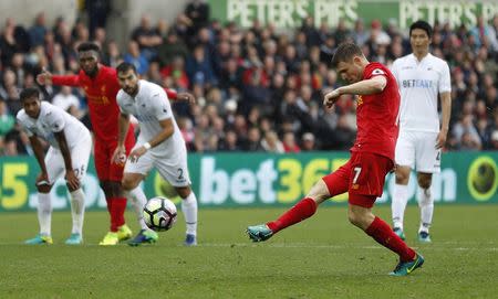 Britain Soccer Football - Swansea City v Liverpool - Premier League - Liberty Stadium - 1/10/16 Liverpool's James Milner scores their second goal from the penalty spot Action Images via Reuters / John Sibley Livepic EDITORIAL USE ONLY.