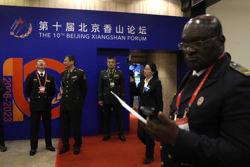 Attendees take part in the 10th Beijing Xiangshan Forum in Beijing, Monday, Oct. 30, 2023. Russian Defense Minister Sergei Shoigu said Monday the United States is fueling geopolitical tensions to uphold its "hegemony" and warned of the risk of confrontation between major countries. (AP Photo/Ng Han Guan)