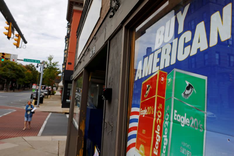 FILE PHOTO: A sign reads "Buy American" in shop window in Easton