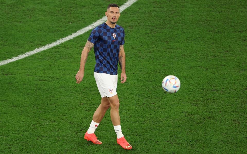 Dejan Lovren of Croatia warms up prior to the FIFA World Cup Qatar 2022 quarter final match between Croatia and Brazil at Education City Stadium on December 09, 2022 in Al Rayyan, Qatar - Alex Pantling/Getty Images