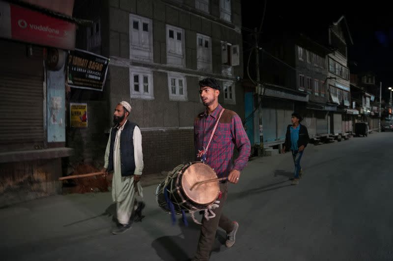 Kashmiri Ramadan drummers wake Muslims up for their meal before daybreak, in Srinagar