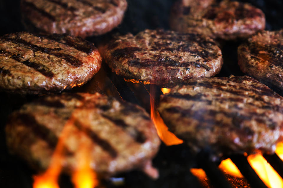 If you're grilling a bunch of patties at once, make sure they're relatively uniform to ensure similar cooking times.  (Getty Images)