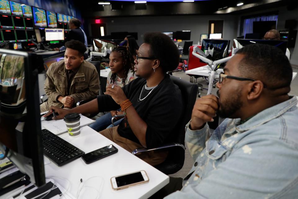 The Black News Channel digital team works together in the newsroom Tuesday, Jan. 7, 2020. 