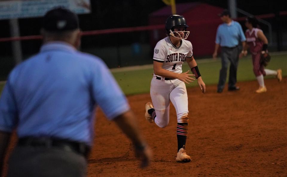 South Fork's Abbie Dewaters races toward third base during the Region 4-5A championship game against Pembroke Pines Charter on Friday, May 19, 2023 in Stuart. The Bulldogs won 8-3 to advance to the state semifinals.