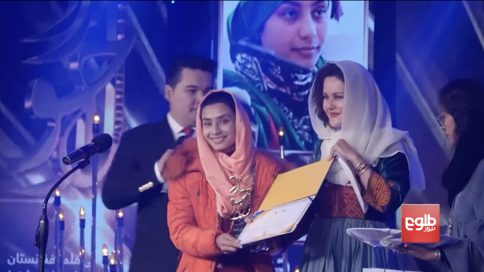 Filmmaker and Afghan Film president Sahraa Karimi presenting an award at the first National Lajward Film Festival last year. - Credit: Tolo News