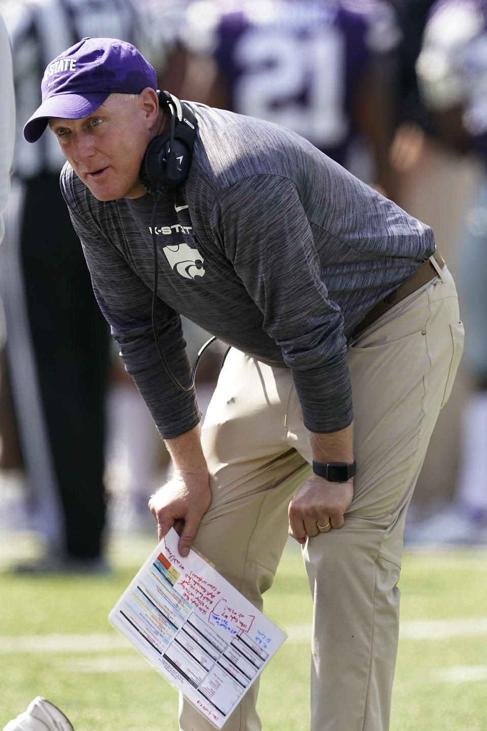 Kansas State head coach Chris Klieman watches during the first half of an NCAA college football game against Nevada on Saturday, Sept. 18, 2021, in Manhattan, Kan. (AP Photo/Charlie Riedel)