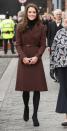 <p>Kate visited Liverpool wearing a chic brown Hobbs coat worn with a black knee length Oasis dress. She paired the look with black tights, a Stuart Weitzman clutch and and matching shoes. </p><p><i>[Photo: PA]</i></p>