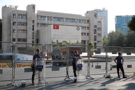 Turkish police stand guard in front of the Metropolitan Municipality headquarters in Diyarbakir