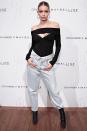 <p>In Jean Atelier body suit and jeans, Giuseppe Zanotti booties, and Luv AJ hoop earrings at the Gigi Hadid x Maybelline New York International Launch Party in NYC.</p>