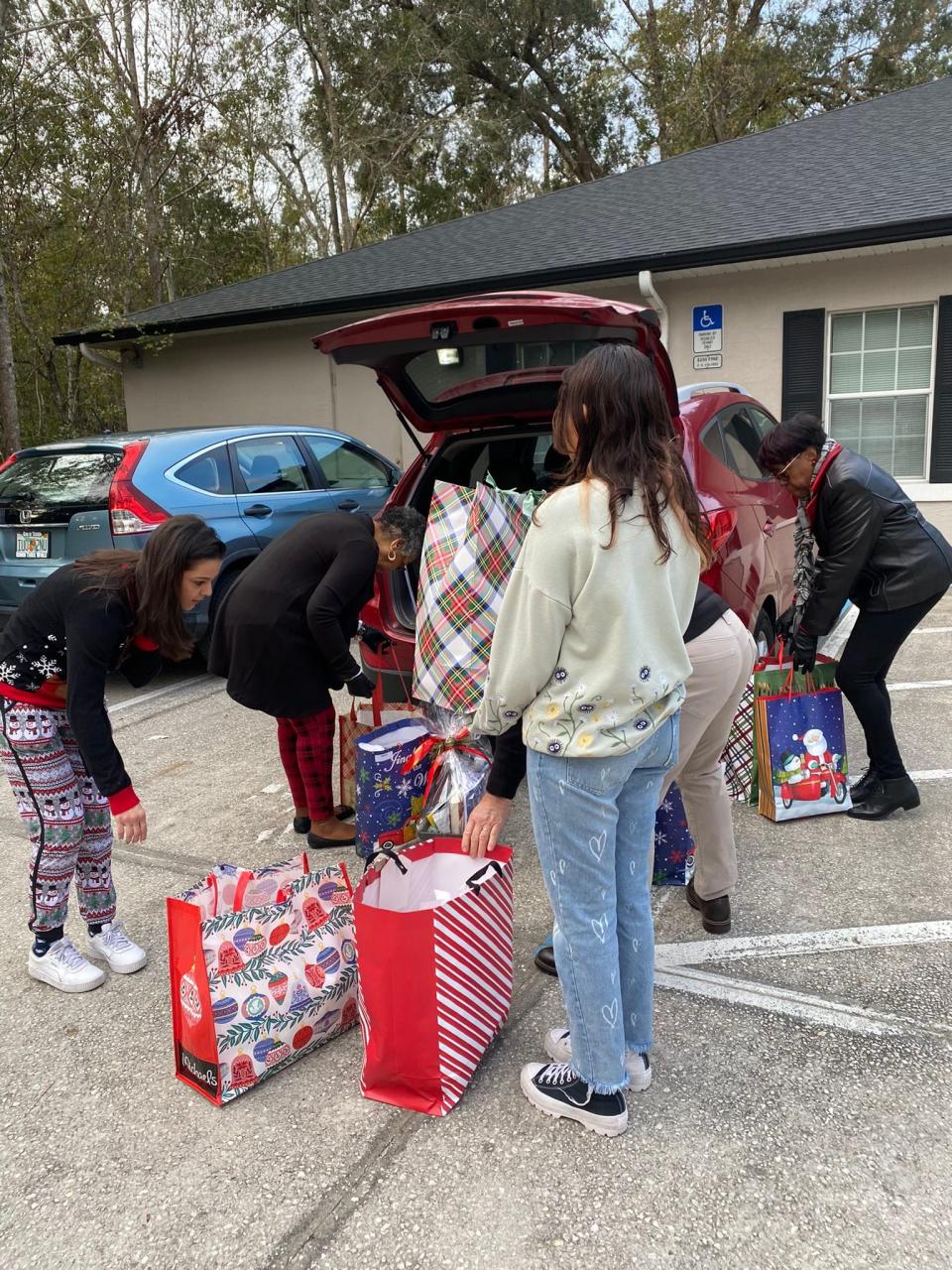 Meals on Wheels, Etc. distribute gift baskets and donations through the Adopt-A-Senior for the Holiday program.