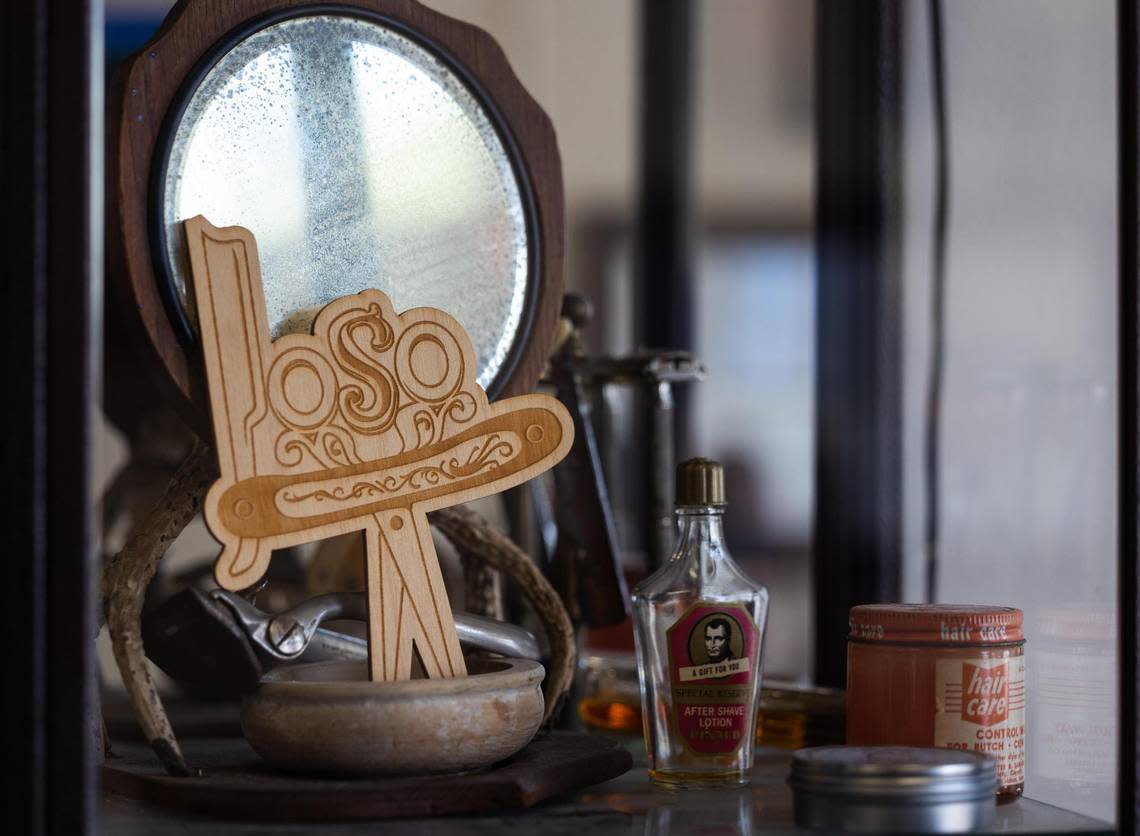 Antique hair products on display at Loso’s Barber Shop in Fort Worth.