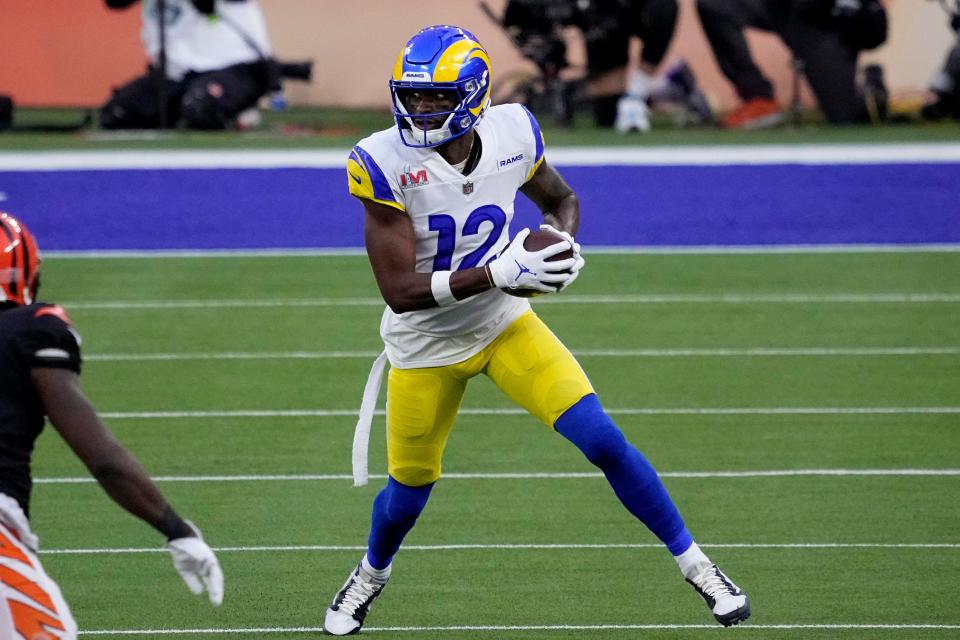 Los Angeles Rams wide receiver Van Jefferson (12) runs against Cincinnati Bengals cornerback Mike Hilton (21) during the first half of the NFL Super Bowl 56 football game Sunday, Feb. 13, 2022, in Inglewood, Calif.