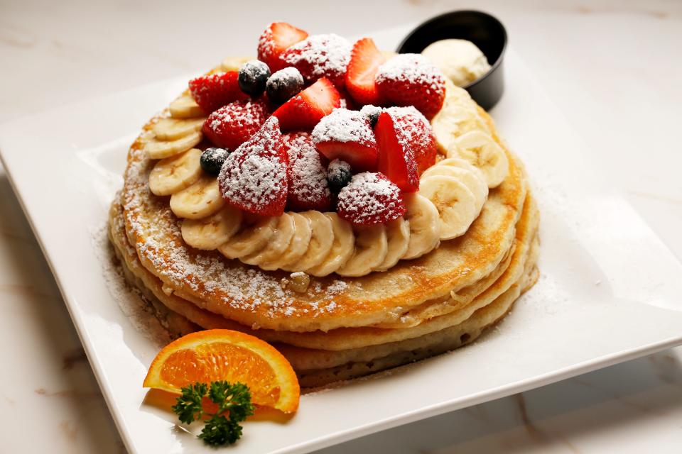 Florida Pancakes with fresh strawberries, banana, blueberries and powdered sugar are a signature offering at Keke's Breakfast Cafe.