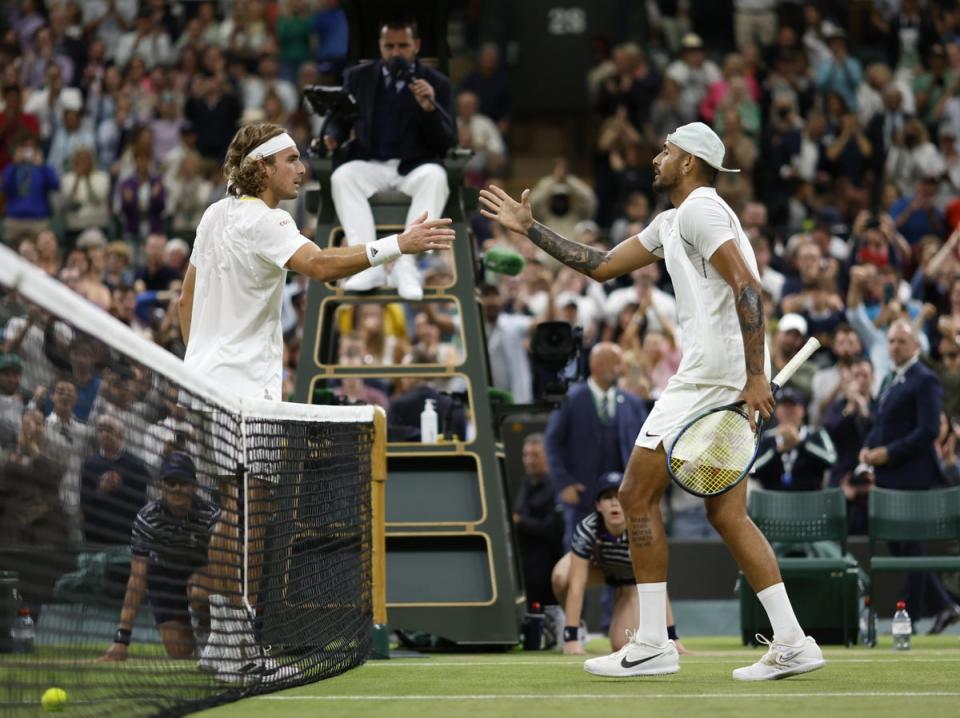 Stefanos Tsitsipas (left) and Nick Kyrgios shake hands (Steven Paston/PA) (PA Wire)