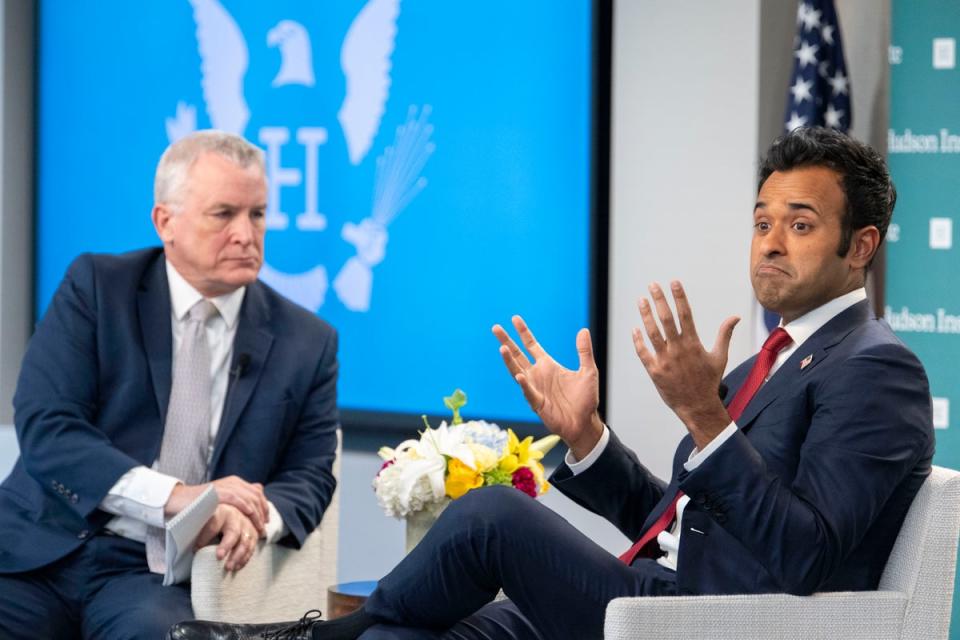 Republican presidential candidate Vivek Ramaswamy, right, talks foreign policy with Michael Doran, a Senior Fellow at the Hudson Institute in Washington (AP)