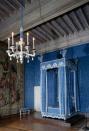 <p>This royal blue bedroom is, indeed, fit for royalty. Château de Chambord was built by King François I in the Sologne marshlands of France. Its construction was finished and the interiors were furnished by King Louis XIV in the 17th century. This classic four- poster bed in the Queen's chamber is the ultimate spot for resting. </p>