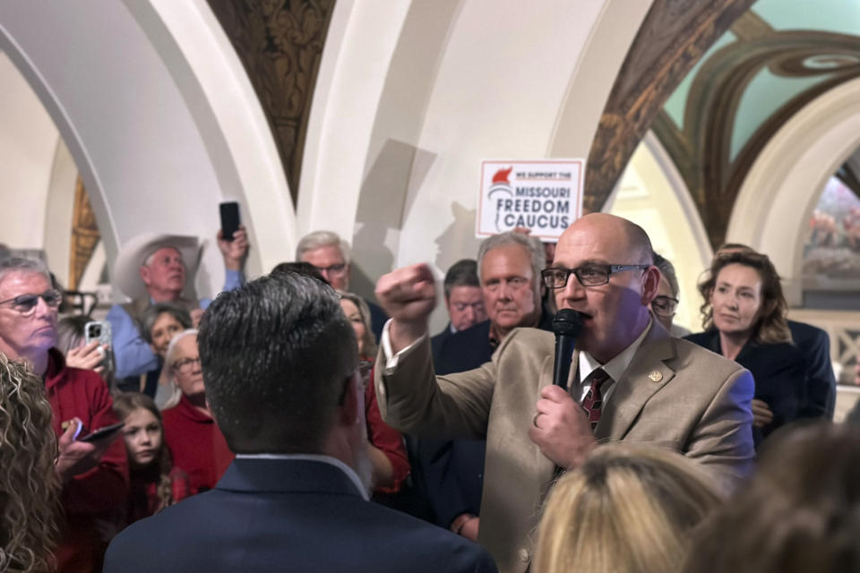 Republican Missouri state Sen. Denny Hoskins, a member of the Freedom Caucus, speaks to hundreds of supporters gathered Tuesday, Jan. 30, 2024, at the Missouri Capitol in Jefferson City, Mo. (AP Photo/Summer Ballentine)