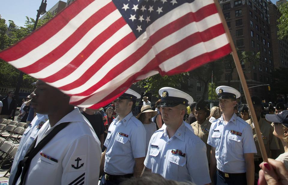 Military members arrive for a Memorial Day ceremony at the Soldiers' and Sailors' Monument in the Manhattan borough of New York May 26, 2014. (REUTERS/Carlo Allegri)