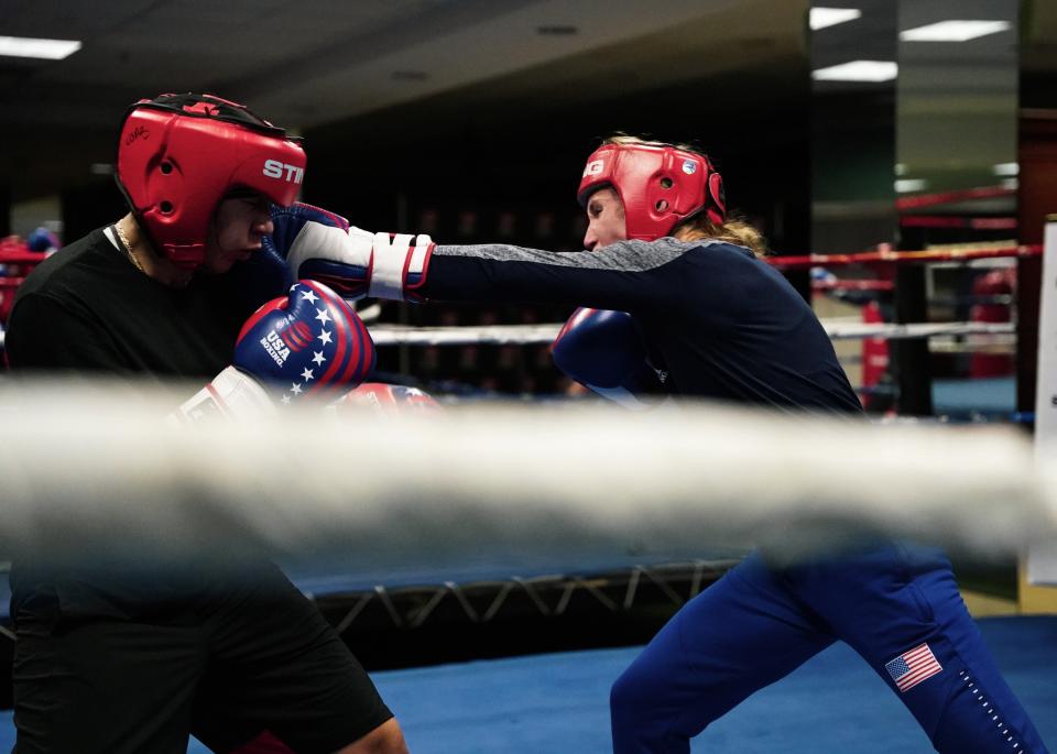 Ginny Fuchs (right) and other U.S. boxers have been training at an abandoned Macy's that USA Boxing converted into a gym.