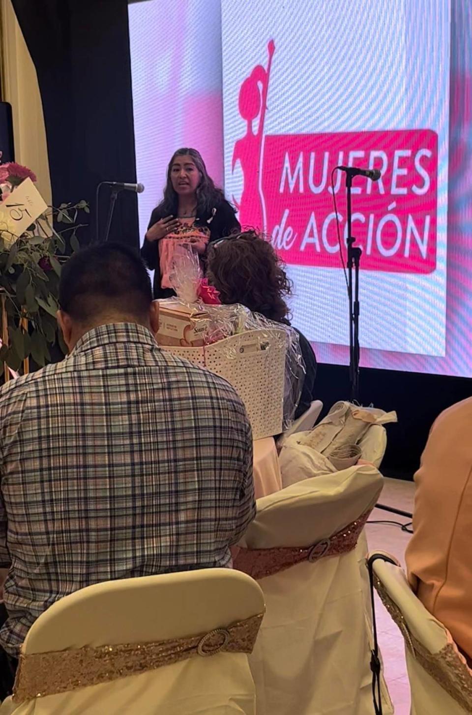 San Luis Obispo resident Claudia Olsen shares her breast cancer journey at the Mujeres de Acción benefit in Paso Robles in October 2022.