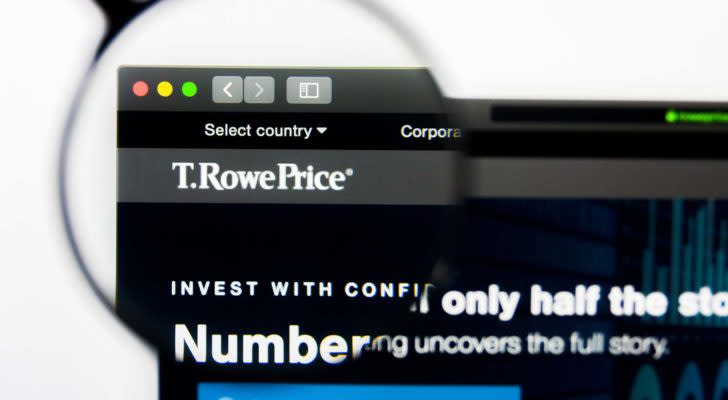 T row price (TROW) logo magnified through a lens while displayed on a web browser