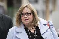 Prosecutor Laura Ditka arrives for Graham Spanier's trial at Dauphin County Courthouse in Harrisburg, Pa., Friday, March 24, 2017. Spanier faces charges that he failed to report suspected child sex abuse in the last remaining criminal case in the Jerry Sandusky child molestation scandal. (AP Photo/Matt Rourke)