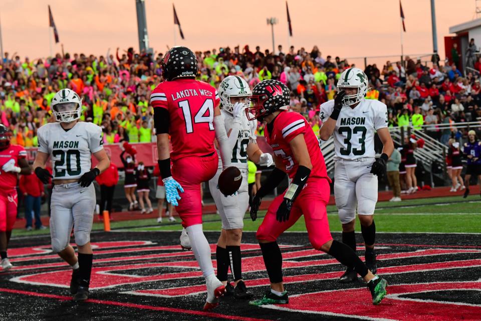 Lakota West wide receiver Brennan Remy (14) finished tied for the GMC-lead in receptions and touchdown catches last season.