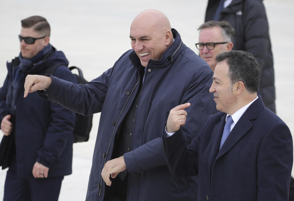 Italy's Defence Minister Guido Crosetto, left, and his Albanian counterpart Niko Peleshi attend an inauguration ceremony at an airbase in Kocuve, about 85 kilometers (52 miles) south of Tirana, Albania, Monday, March 4, 2024. NATO member Albania inaugurated an international tactic air base on Monday, the Alliance's first one in the Western Balkan region. (AP Photo/Armando Babani)