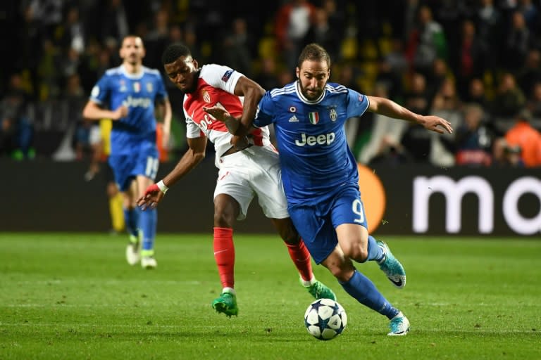 Gonzalo Higuain (R) urged Juventus teammates not to get carried away after their win over Monaco in the Champions League semi-final first leg, "we have not won anything yet"