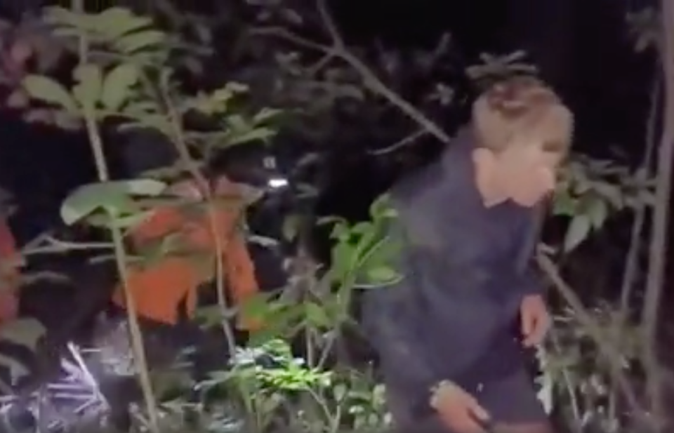 Footage showed Matthew and Andrew Forster being rescued by officials after a vast search effort on Mt Agung (screengrab)