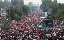 Supporters of Iraqi Shi'ite cleric Moqtada al-Sadr protest against what they say is U.S. presence and violations in Iraq, during a demonstration in Baghdad