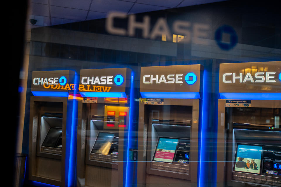 Chase ATM machines are seen in New York City, U.S., March 17, 2020. REUTERS/Jeenah Moon