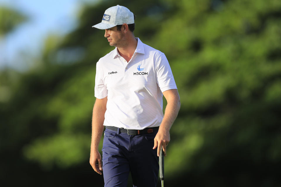 Harris English walks the 11th green during the first round of the Sony Open golf tournament Thursday, Jan. 14, 2021, at Waialae Country Club in Honolulu. (AP Photo/Jamm Aquino)