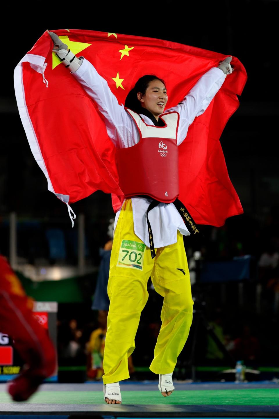 <p>Shuyin Zheng of China celebrates beating Maria del Rosario Espinoza Espinoza of Mexico during the Taekwondo Women +67kg Gold Medal Contest on Day 15 of the Rio 2016 Olympic Games at Carioca Arena 3 on August 20, 2016 in Rio de Janeiro, Brazil. (Photo by Jamie Squire/Getty Images) </p>