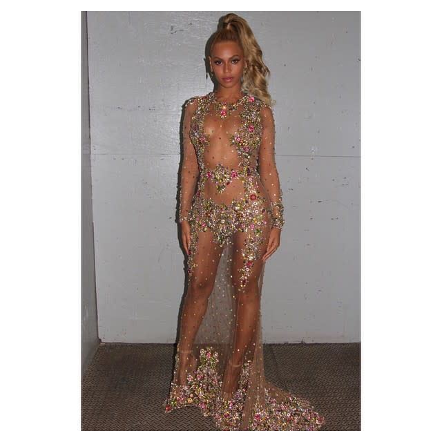 While Kim Kardashian probably thought she won the title of "Closest to Being Nude" at the 2015 Metropolitan Museum of Art’s Costume Institute gala, she didn't hold a candle to Beyonce. <strong>VIDEO: 6 Met Gala Moments That You Just Need to Remember Again </strong> The "Drunk in Love" singer showed some serious skin in her sheer, jewel-encrusted, Givenchy Haute Couture gown that left very little to the imagination. Getty Images Beyonce first revealed the gown on Instagram in a series of racy shots that looked like she was trapped in the basement of a New York warehouse. While the dress showed off nearly every part of her body, Beyonce topped the risqué look off with a retro top-knot pony tail that made her look like Barbara Eden from <em> I Dream of Jeannie. </em> Getty Images While Beyonce is known for rocking sheer and sexy outfits to the annual fashion extravaganza, this year she really went all out. So much so that she couldn't really blend in -- especially next to her husband Jay Z, who was decked out in a traditional tux. Getty Images Then again, since when has Beyonce ever blended in? She's the damn queen, and queens stand out in style. <strong>PHOTOS: The 9 Best Dressed Stars at the 2015 Met Gala </strong> That being said, as racy as her dress was, it still couldn't draw some people's attention. Like this dude in the background who is way more interested in his slice of pizza than any of us will ever be interested in anything. http://t.co/0lFlPjwtnJ Pizza Man Photobombs Jay Z, Beyonce With Slice on Met Gala 2015 Red Carpet: Funny Photo #F… pic.twitter.com/cMy8GUEXGr— Fanuendo (@Fanuendo) May 5, 2015 Where do you even get pizza on the red carpet? Are there pizza street vendors just all along the Met Gala arrivals line? Is this the Met Gala's best kept secret? If so, this random guy really messed that up for all the other reporters enjoying secret pizza. <strong>NEWS: Rihanna Shuts Down 2015 Met Gala Red Carpet With Epic Yellow Cape </strong> But you can't blame Beyonce! She was giving it her all, with the assistance of hundreds of gorgeous gems that made her shine all the brighter. She even took the time to take a photo of her jewelry and post it to Instagram along with a shout out to Givenchy. Yup, that's a photo of the jewels. The jewels are the point and focus of that photo. Great job looking great, Bey. The annual Met Gala is the one of the biggest events in fashion every year, and often finds itself at the center of industry controversy and commentary. Check out the video below for a look at six of the biggest Met Gala moments from recent years.