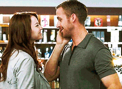 Emma Stone and Ryan Gosling touching each others faces in "Crazy Stupid Love"