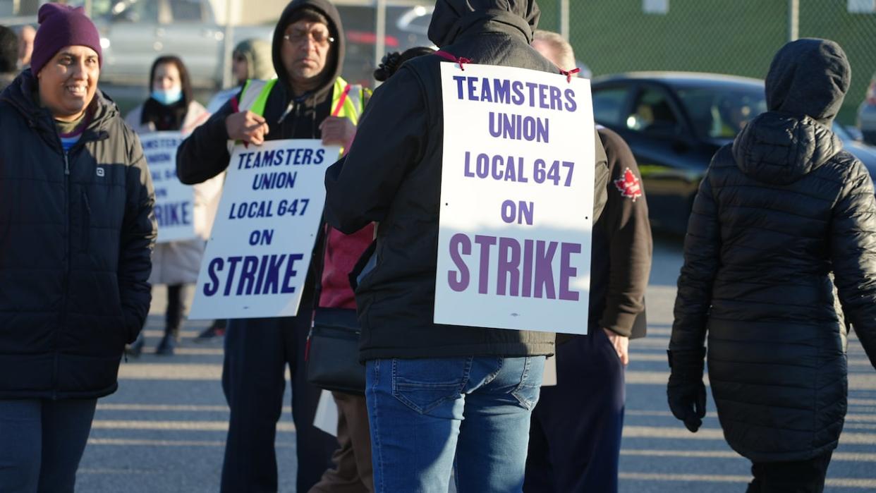 Gate Gourmet workers based at Pearson airport went on strike Tuesday after contract negotiations with their employer broke down. (Paul Smith/CBC - image credit)