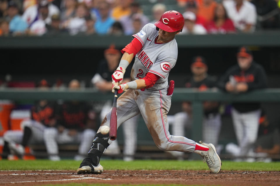 Cincinnati Reds' TJ Friedl connects for an RBI single to score Will Benson in the second inning of a baseball game against the Baltimore Orioles, Wednesday, June 28, 2023, in Baltimore. (AP Photo/Julio Cortez)