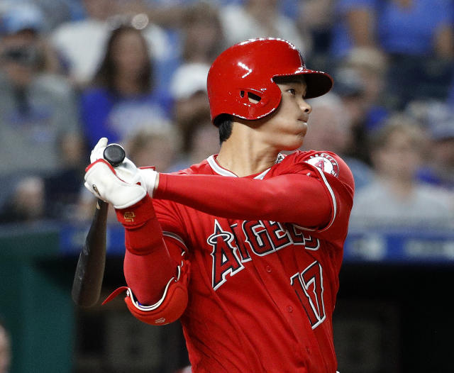 A fan of Japan's Shohei Ohtani buys a souvenir with his name on at